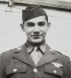 Joseph Skubal standing next to a building wearing his Army uniform