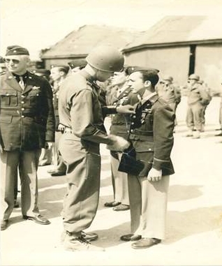 Madison Putnam and fellow soldiers being pinned during a ceremony