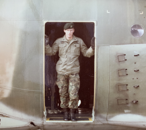 Michael Field standing in the door of an Army plane