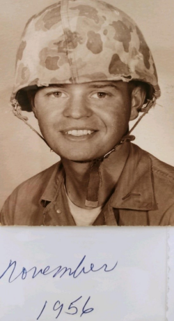 Patrick O'brien wearing a military helmet in November 1956