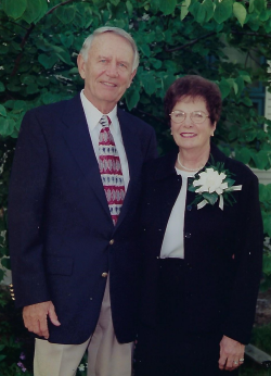 Robert Benson standing with his wife Jacqueline