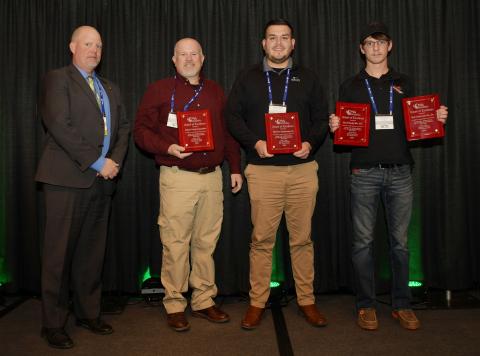 ICPA honorary presenter David Carney, Public Works Director of the city of Sioux City presents the Best Recreational Trails Award for 2021 to Brad Freidhof representing the JCCB, Michael Guajardo representing McClure Enginnering and Geoff Streb from Streb Construction Company 